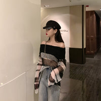 Rags n Rituals 'Falter' black and white open knit sweater at $36.99 USD