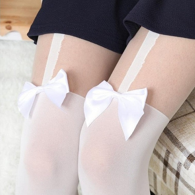 Rags n Rituals Black or white bow mock suspender tights at $10.99 USD